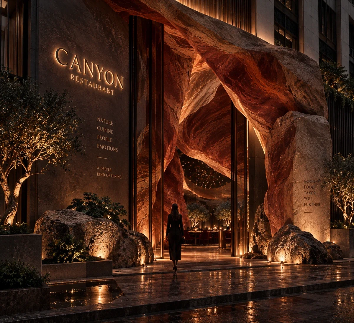 Entrance of the CANYON restaurant concept at night, with illuminated signage, sculptural stone walls and warm light spilling onto wet stone.